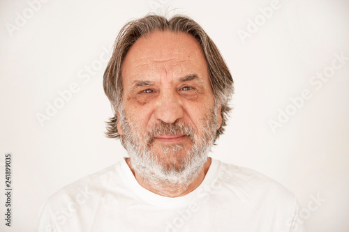 Portrait elderly man on white background