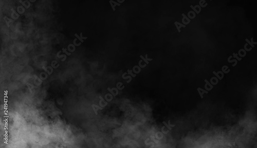 Smoke on the floor . Isolated black background.