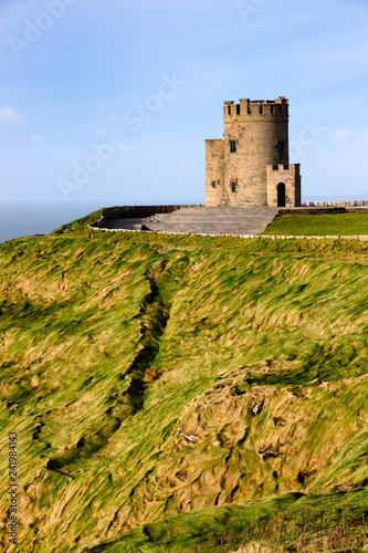 Castle tower over Cliffs of Moher