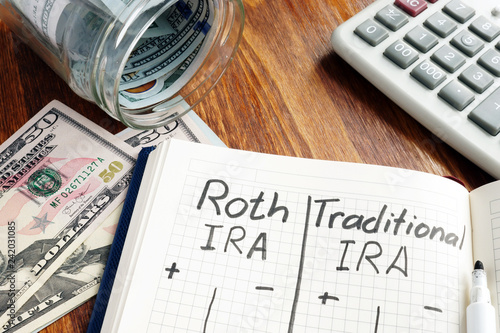 Roth IRA vs Traditional IRA written in the notepad.