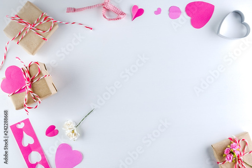 Hand-made pink love hearts and Gift box isolated on white wooden texture background, Happy valentine's day. holiday background, Flat lay, top view, copy space