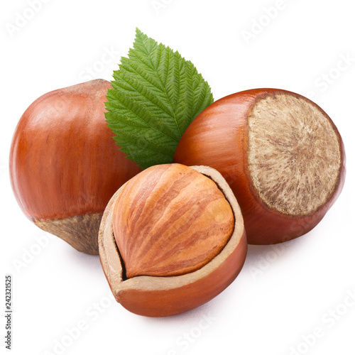 Hazelnuts with leaves, isolated on white background