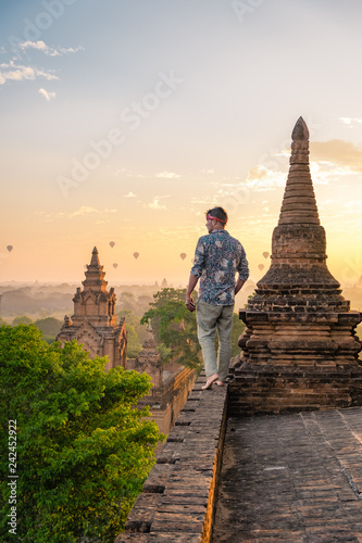 young men traveler Bagan temple during sunset Myanmar, sunrise Bagan man by temple pagoda