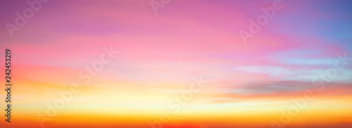 Beautiful Panorama of bright sky and clouds at morning background. Sky pink and blue colors.