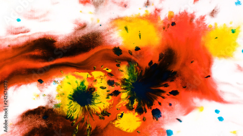 Ink watercolor paint drops onto a wet sheet, psychedelic abstract spray on paper
