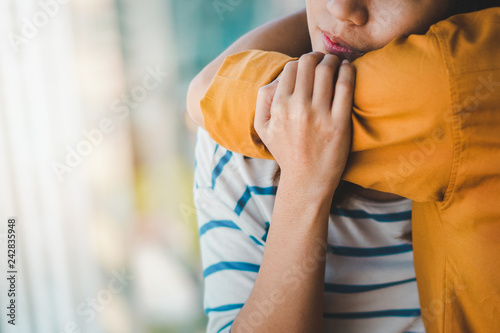 Young depressed asian woman hug her friend for encouragement, Selective focus, PTSD Mental health concept.