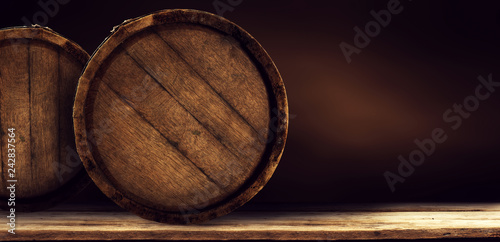 Wooden retro old barrel on desk and free space for your decoration 