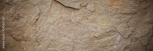 Textured stone sandstone surface. Close up image