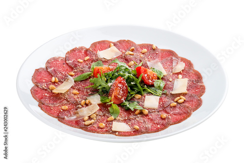 Tuna carpaccio with Parmesan cheese. On white background