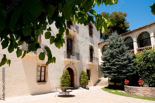 traditional historic catalan house called masia in spanish countryside, perfect location for summer holidays