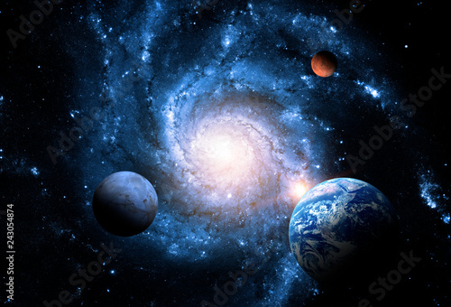 Planets of the solar system against the background of a spiral galaxy in space. Elements of this image furnished by NASA.