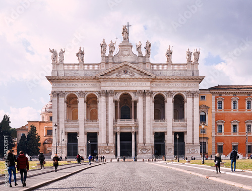 Italy, Rome, January 1/ 2019, St. John Lateran Basilica (Basilica di San Giovanni in Laterano) tourists walk on the avenue of the Basilica