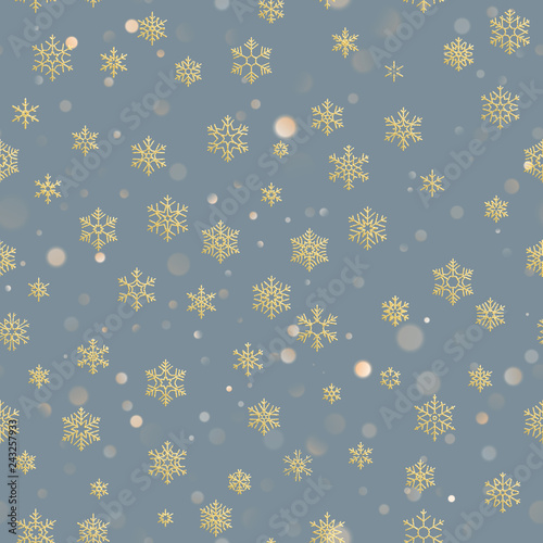 Christmas seamless pattern with gold snowflakes on light blue background. Holiday design for Christmas and New Year decoration. EPS 10