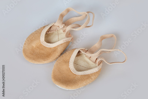 Rhythmic Gymnastics toe shoes isolated, half lyrical shoes nude colour