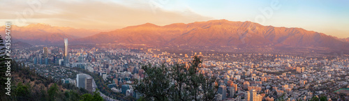 Panoramic aerial view of Santiago skyline at sunset with Andes Mountains - Santiago, Chile