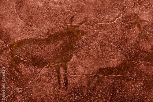 image of ancient people and animals on the cave wall. history of antiquities, archeology.