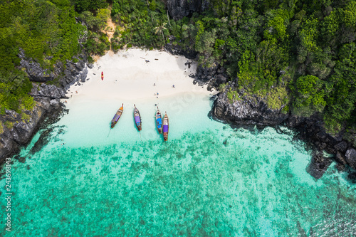 adventure style hi season thai and foreign tourists long tail boat and driving see coral on phi phi island kra bi Thailand aerial top view from drone