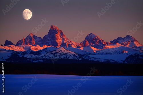 Sunset Light Alpen Glow on Tetons Teton Mountains wtih Moon Rising