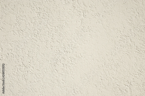 roughcast plaster wall background texture in off-white