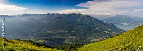 Panoramic view of Pizzo di Gino, Monte Grona, Monte Legnone, Lake Como and surrounding mountains as seen from Monte Tremezzo