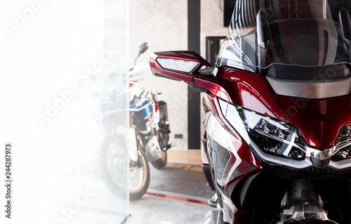 motorcycle bigbike in showroom with soft-focus and over light in the background