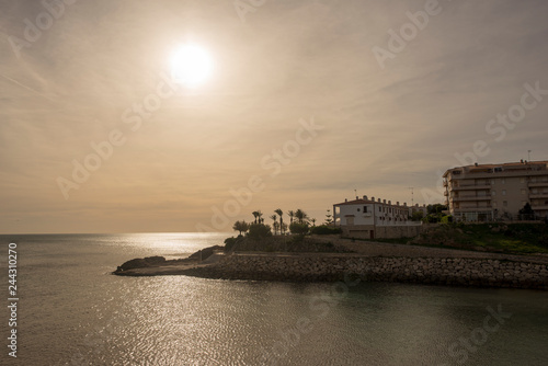 Sunrise on the darted coast of Tarragona