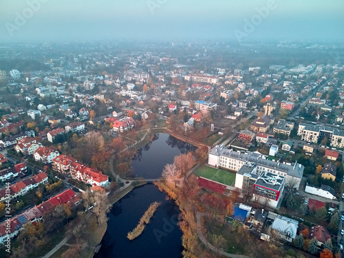 Beautiful panoramic aerial drone view to Cietrzewia ponds or Glinianki Cietrzewia - two water reservoirs, located in Warsaw, in the Włochy district
