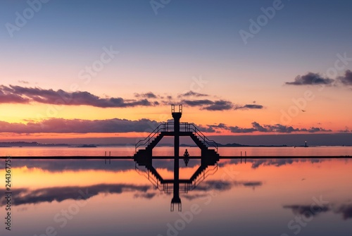 Winter sunset at Saint-Malo and amazing reflection on water