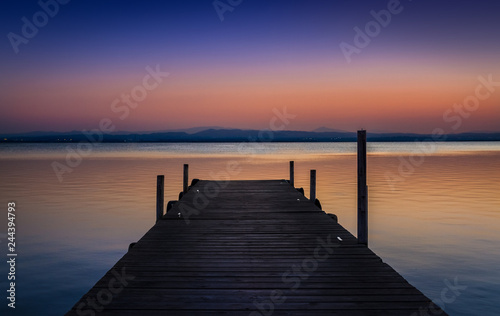 Pier at sunset on the lake