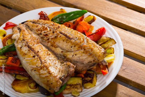 Dish of bulgarian cuisine of tasty baked vegetables with mackerel