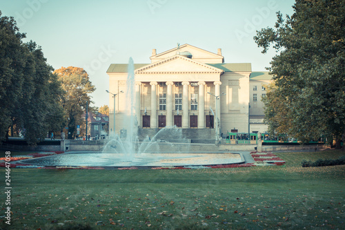 Poznan, Poland - October 12, 2018: Park with fountain before Great Theater of Stanisław Moniuszko in polish city Poznan
