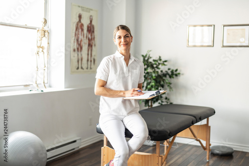 A Modern rehabilitation physiotherapy woman worker at job