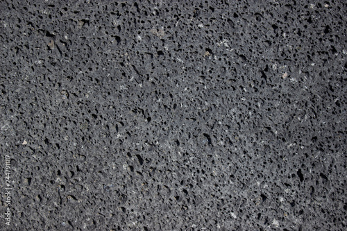 texture, basalt, basalt wall, volcanic rock, stone with holes 