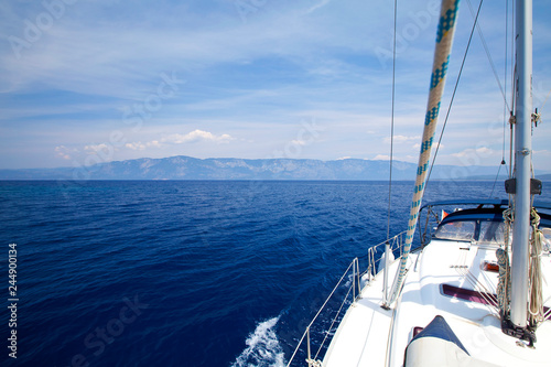 Sail boat gliding in open sea at sunshine. Aegean and mediterranean sea side of Turkey. Marmaris/Mugla