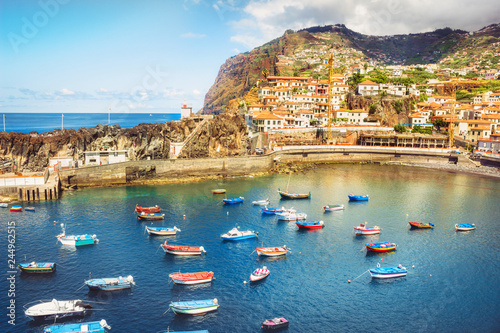 Colorful fishing boats in Camara de Lobos port. Madeira island, Portugal