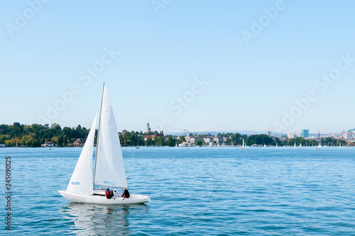 White sailing boats in lake Zurich, Switzerland