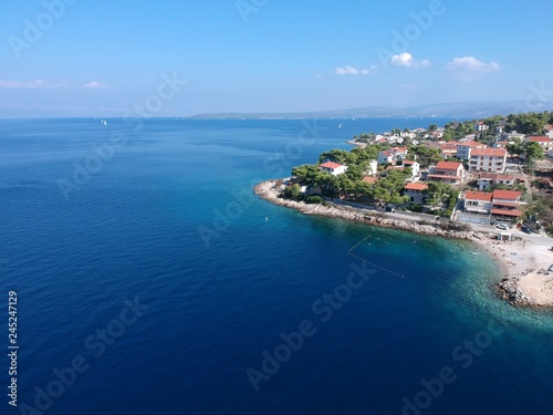 Panoramic Aerial bird view of famous fisherman village island Solta south of Split in sunny summer day, Croatia.
