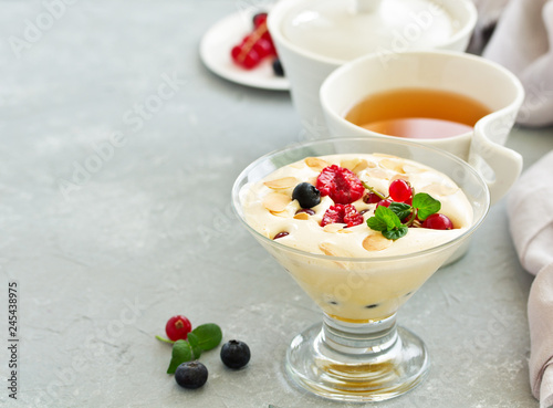Zabaglione with champagne and berries. French dessert.