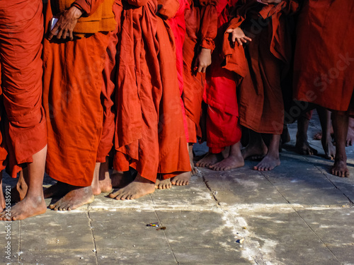 Monks waiting in a line