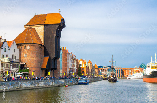 Zuraw Crane and colorful buildings on Motlawa river, Gdansk, Poland