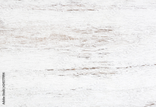 Grunge background. Peeling paint on an old wooden table. White wooden texture for background. Top view.