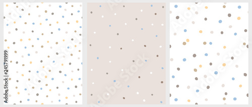Set of 3 Hand Drawn Irregular Dots Patterns. Blue, Brown and Beige Dots on a White Background. BLue, White and Brown Dots on a Beige Background. Infantile Style Abstract Art. Cute Repeatable Design.