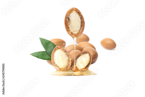 ARGAN SEEDS isolated on a white background. Argan oil and argan nuts concept