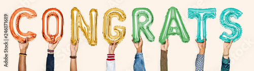 Colorful alphabet balloons forming the word congrats