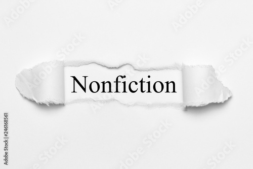 Nonfiction on white torn paper