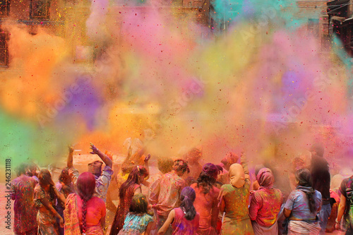 People celebrating Holi festival of colors, India 