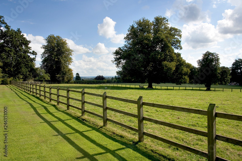 Post and rail fencing around a tidy paddock