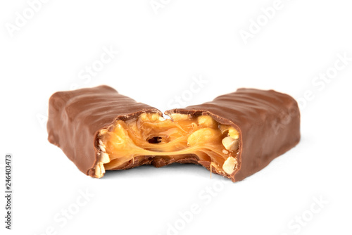 Chocolate bar with caramel and peanut isolated on white background. 