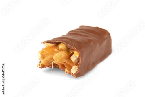 Chocolate bar with caramel and peanut isolated on white background. 