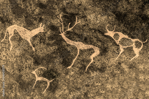 image of ancient animals on the cave wall. antiquity, archaeology.